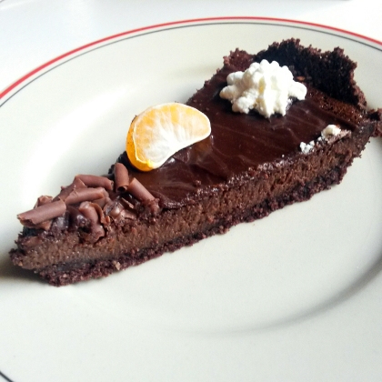 A slice of chocolate hazelnut tart